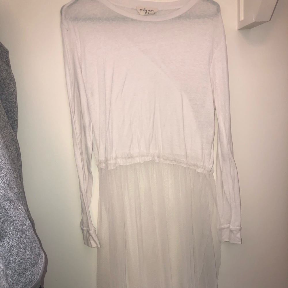 white sheer shirt with tutu material on bottom